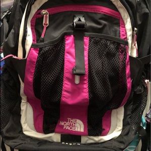 North face recon backpack.